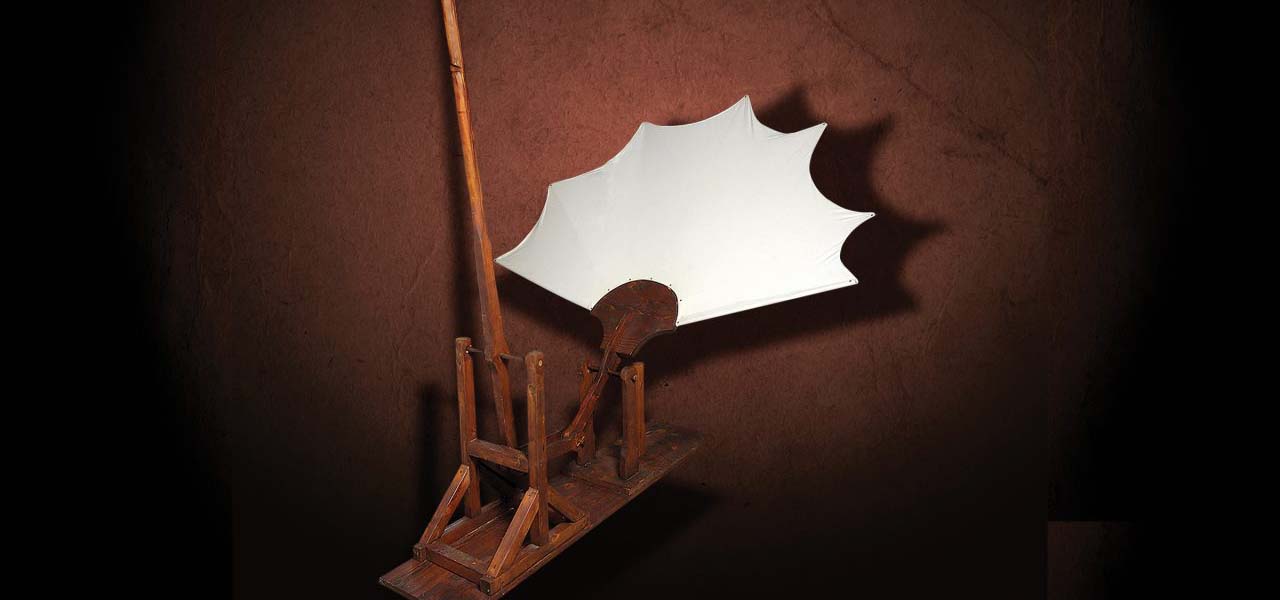 Graphic of one of Leonardo DaVinci's inventions made of wood and with a white sail or screen.