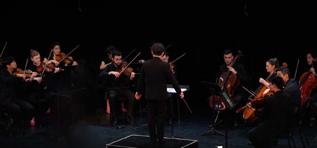 An orchestra playing.