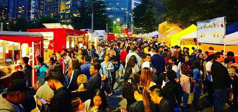 Night market vendors and patrons.