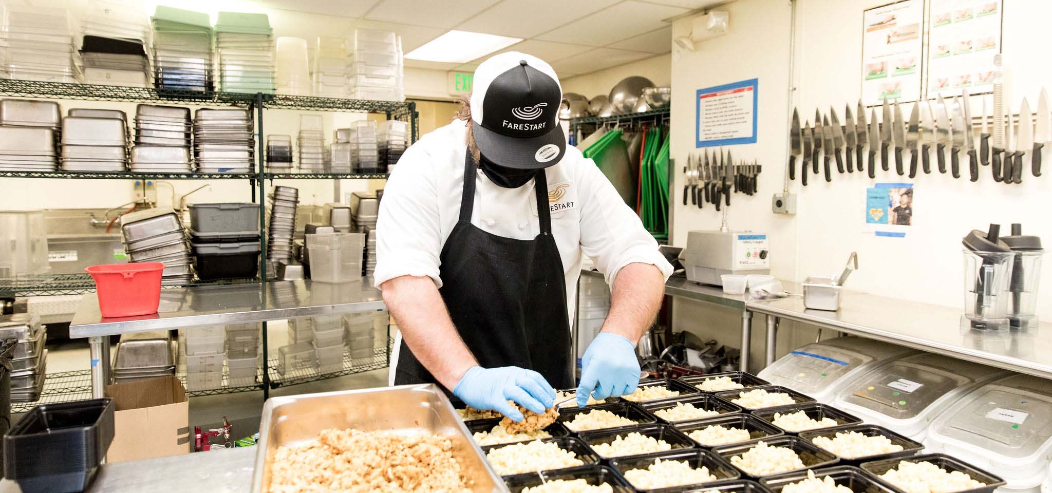 Chef preparing bulk meals.