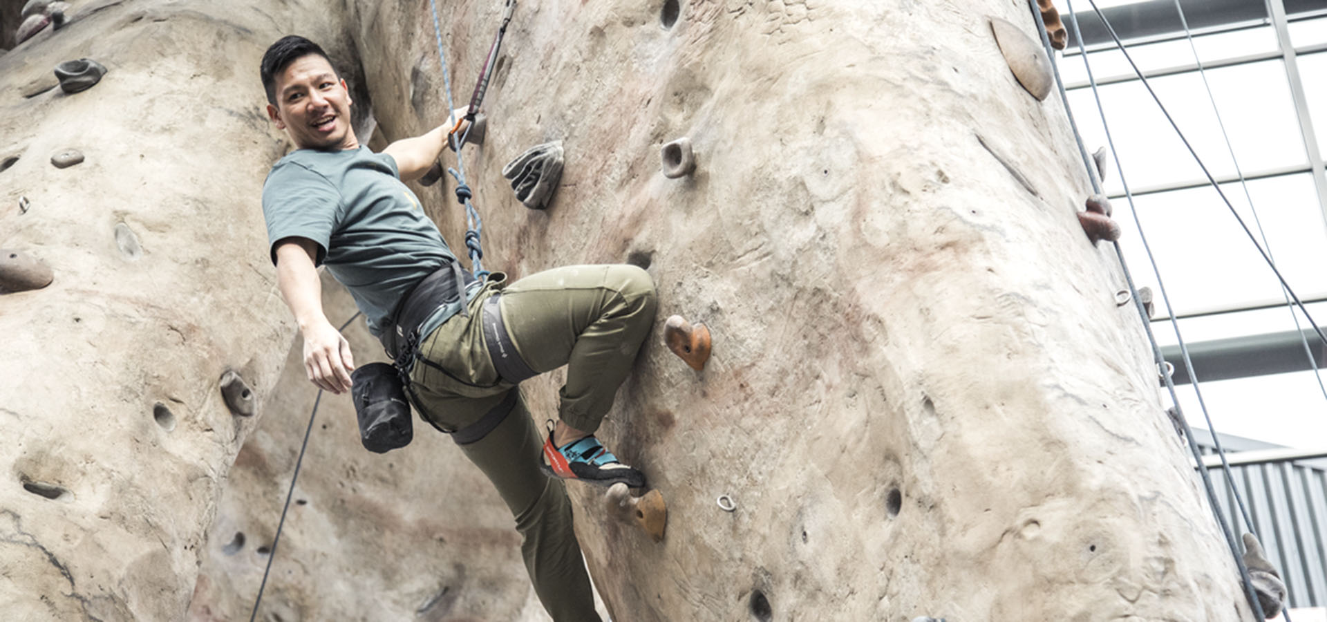 man rock climbing