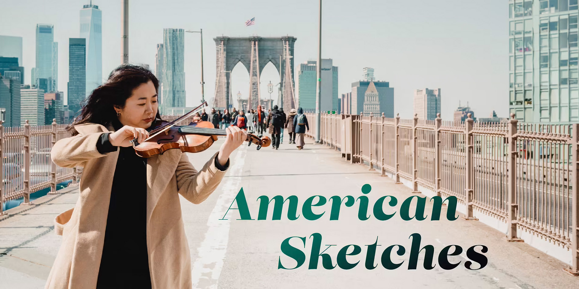 woman playing violin on bridge