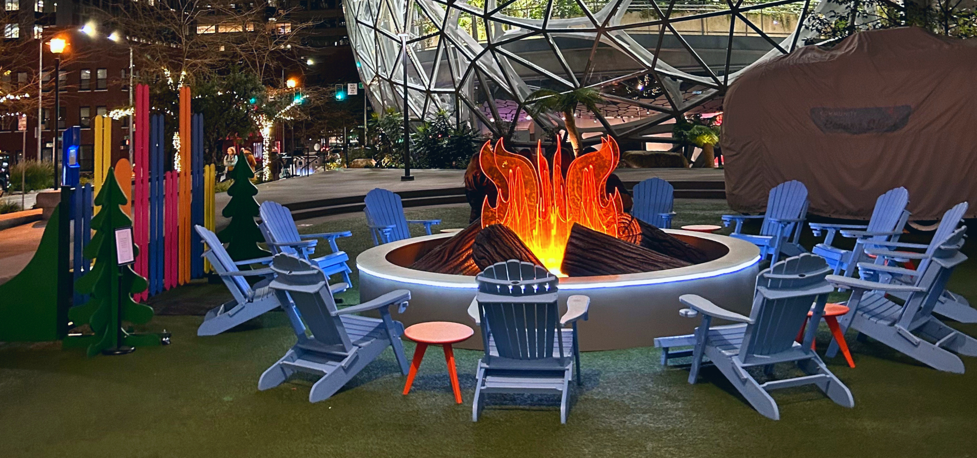 Corporate plaza with a campfire set up for patrons.