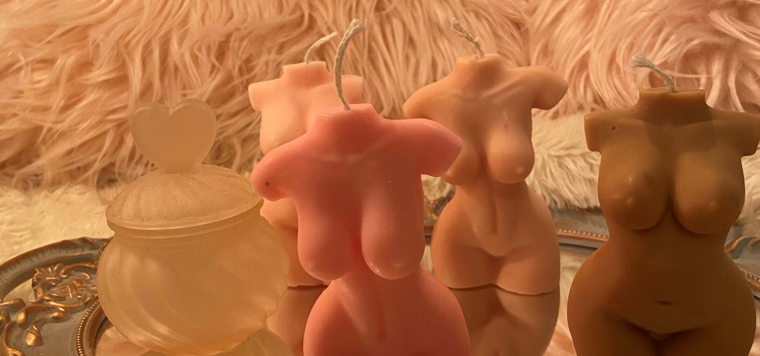 Wax candles shaped like naked women's bodies.