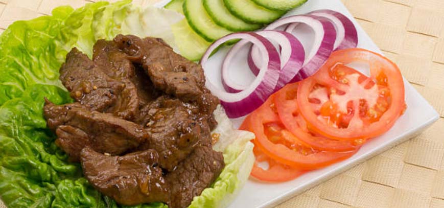 French Vietnamese dinner plate with meat and vegetables.