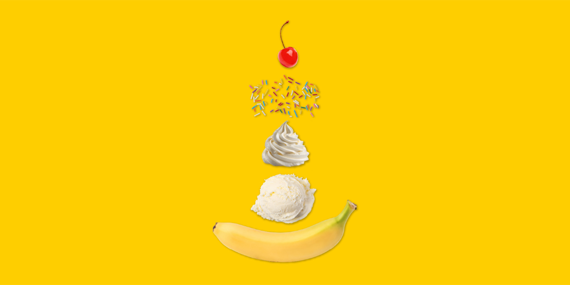banana sundae ingredients on yellow background