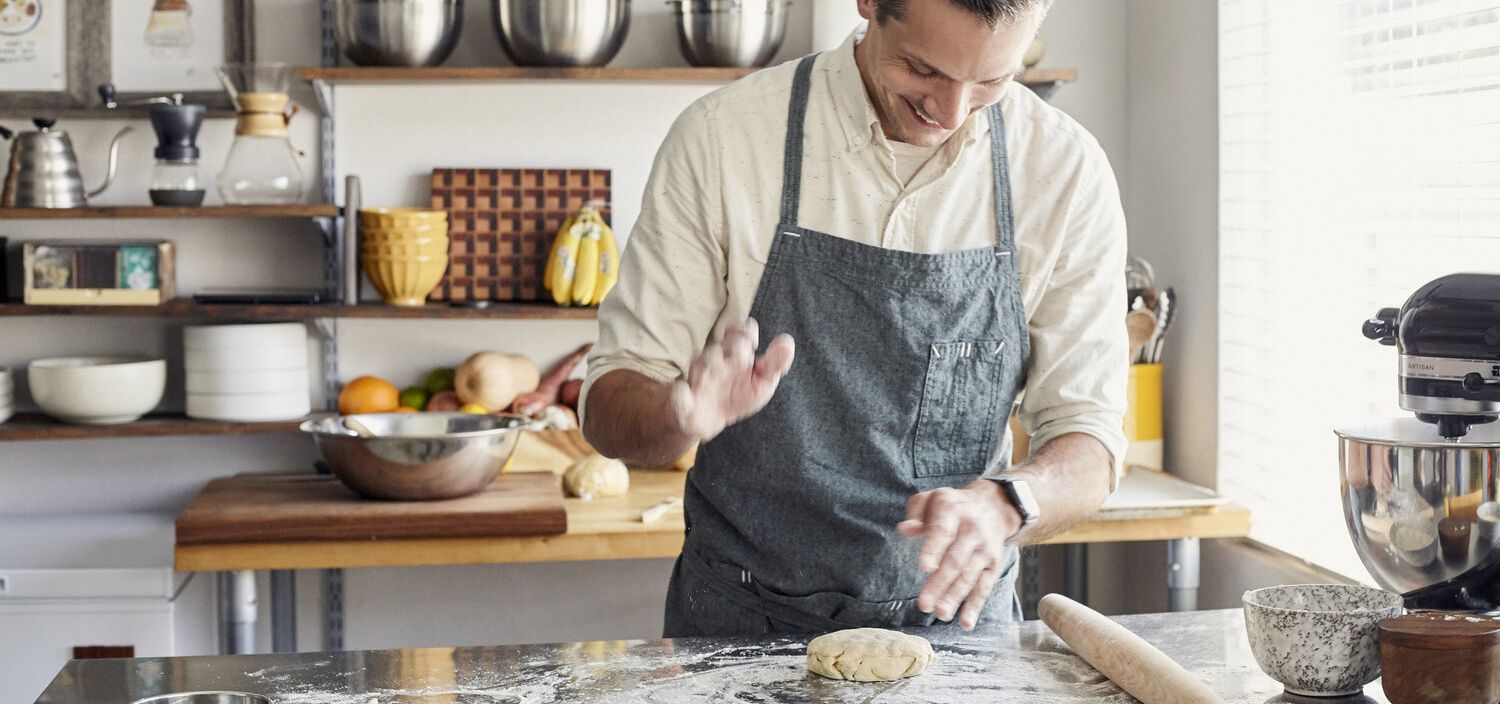 Man making a pie dough.