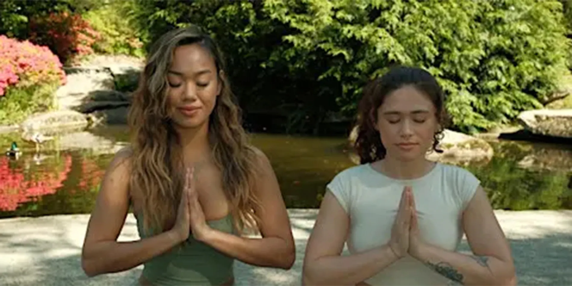 two people meditating