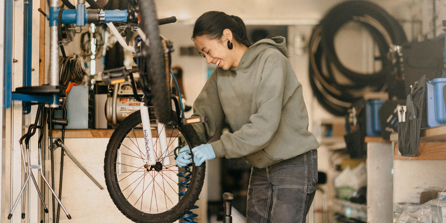 woman fixing bike
