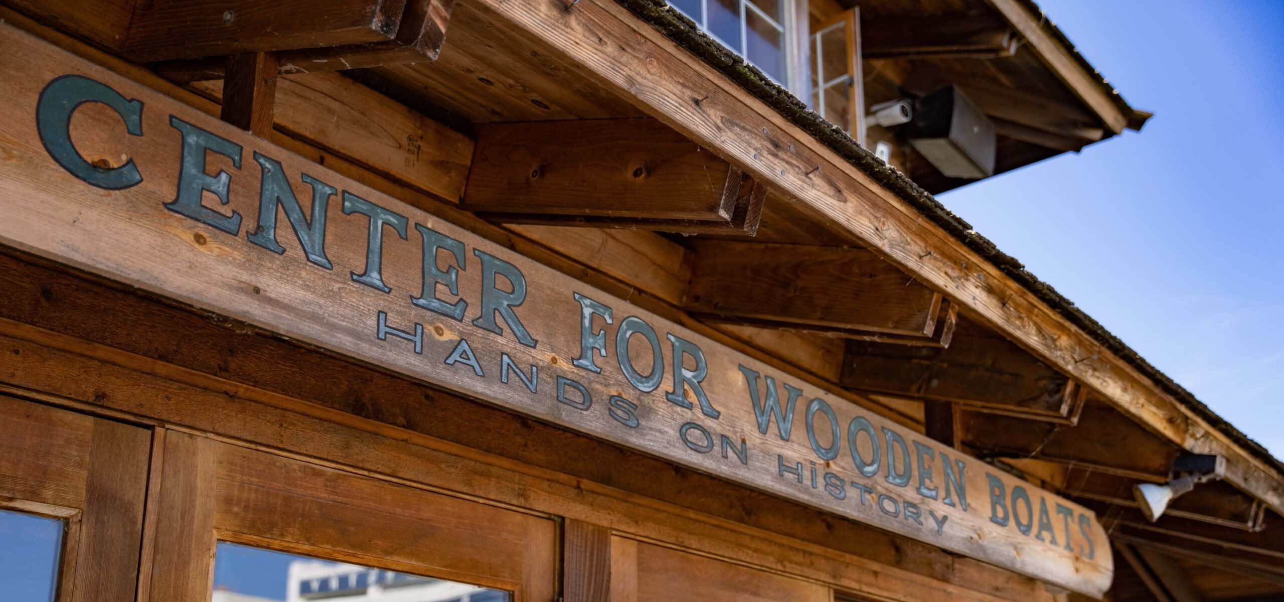 Center for Wooden Boats wooden building entrance sign.