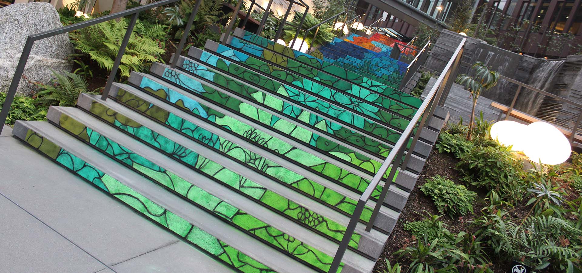 Chalk art by artist Josephine Rice on exterior steps at Amazon's Re:Invent building