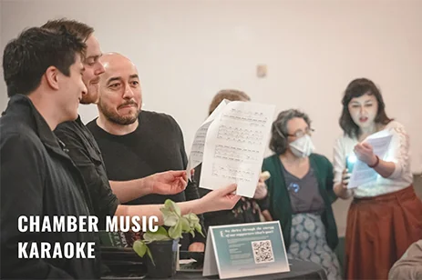 people looking at sheet music