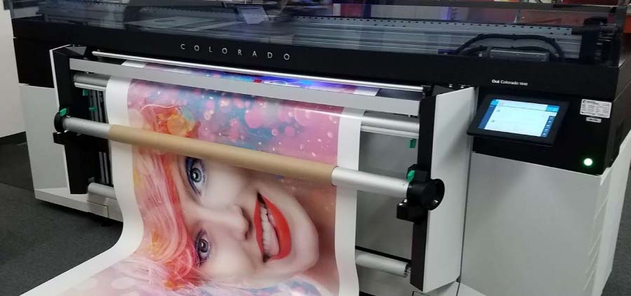 A larger printer/copier making a poster.