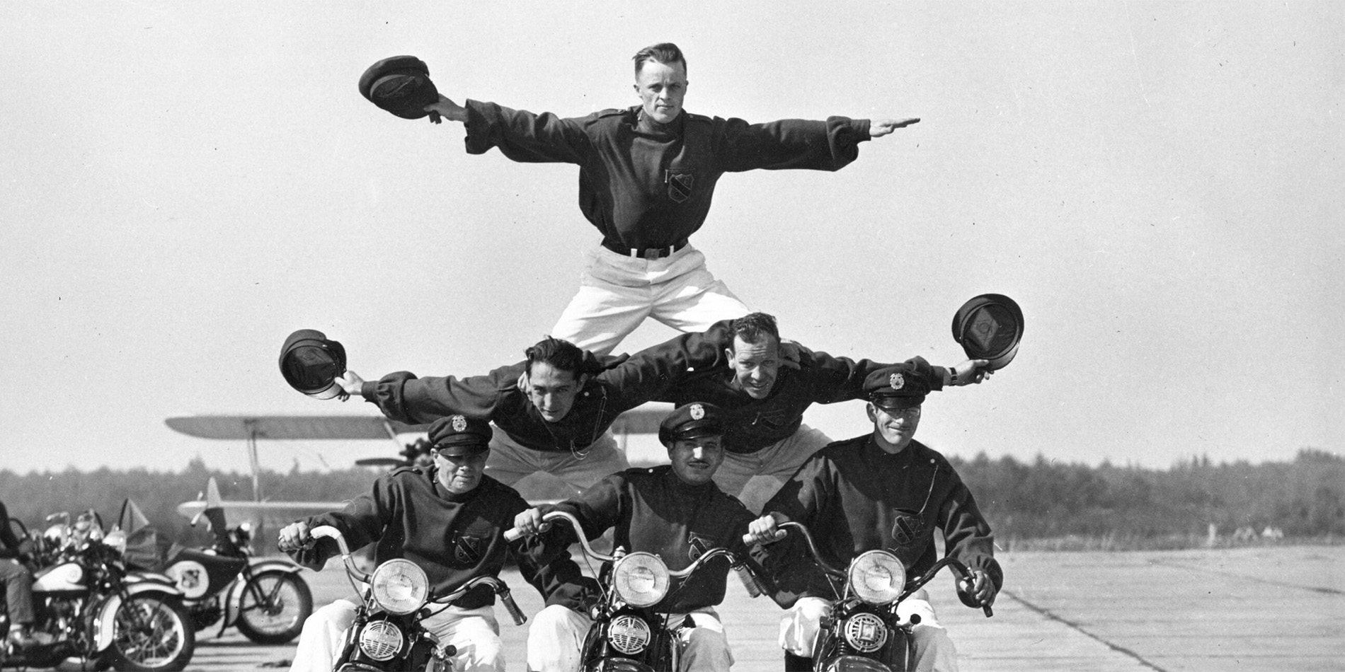 historical image of motorcycle stunt team