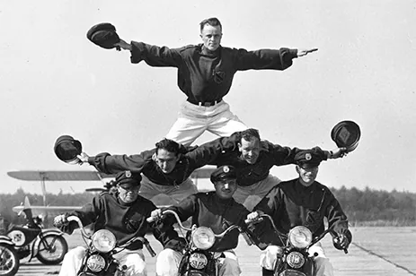 historical image of motorcycle stunt team