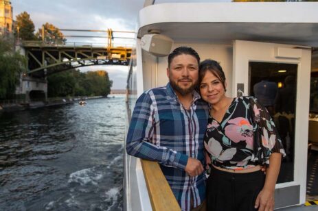 A couple embracing on a cruise ship.