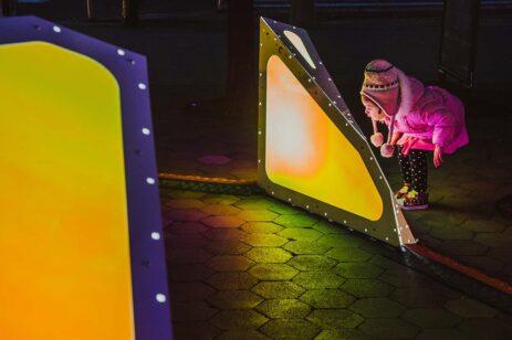 Glowing geometric shapes installed as outdoor art.