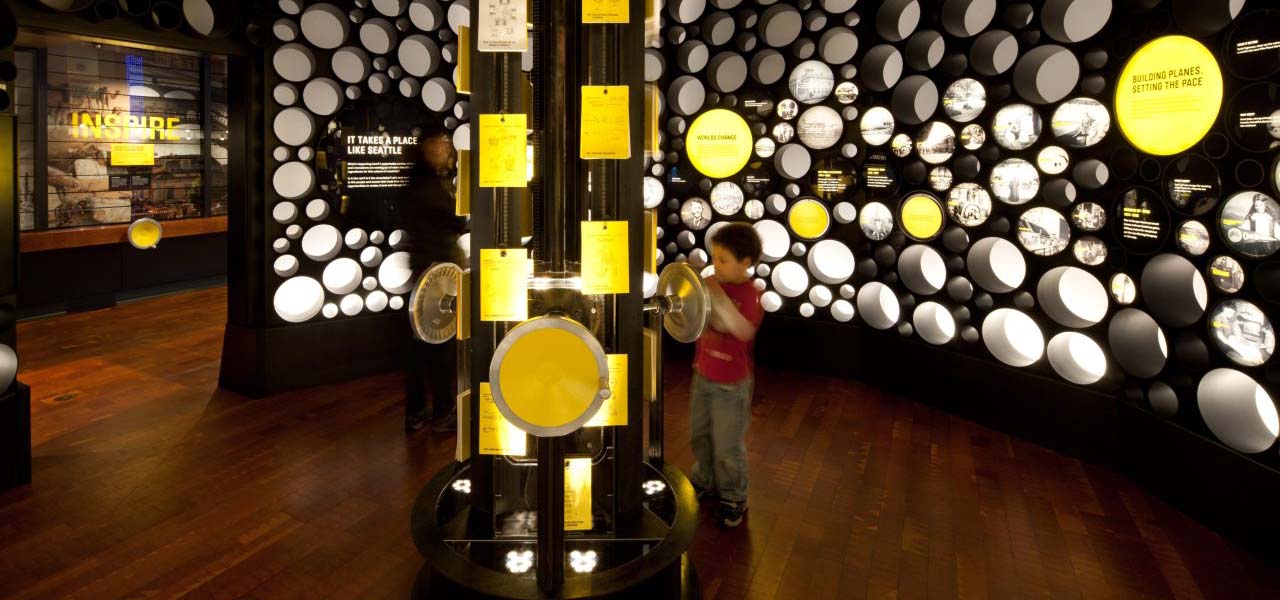 Boy exploring in a museum.