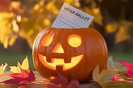 jack-o-lantern with voting ballot