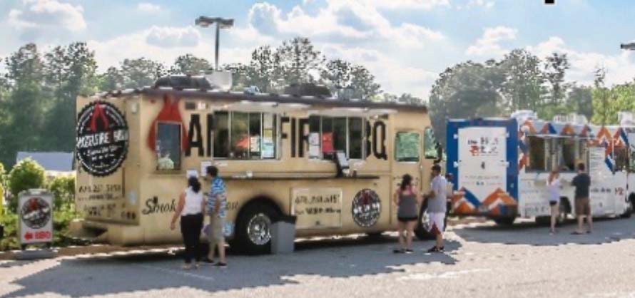 Row of food trucks.