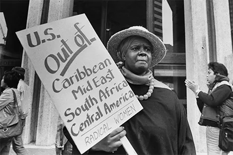 person holding protest sign
