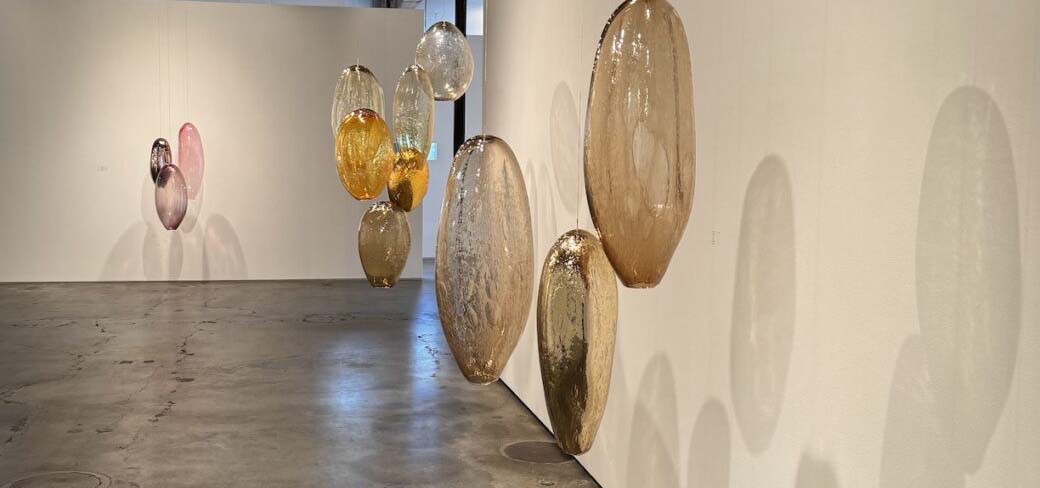Modern art display of hanging glass bubbles.
