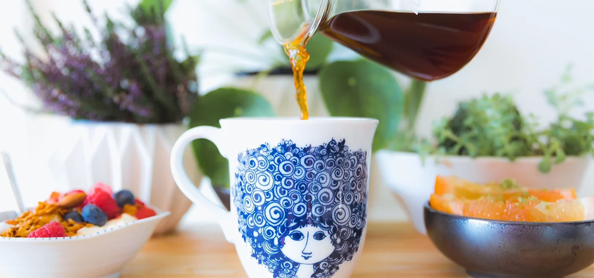 tea being poured into cup