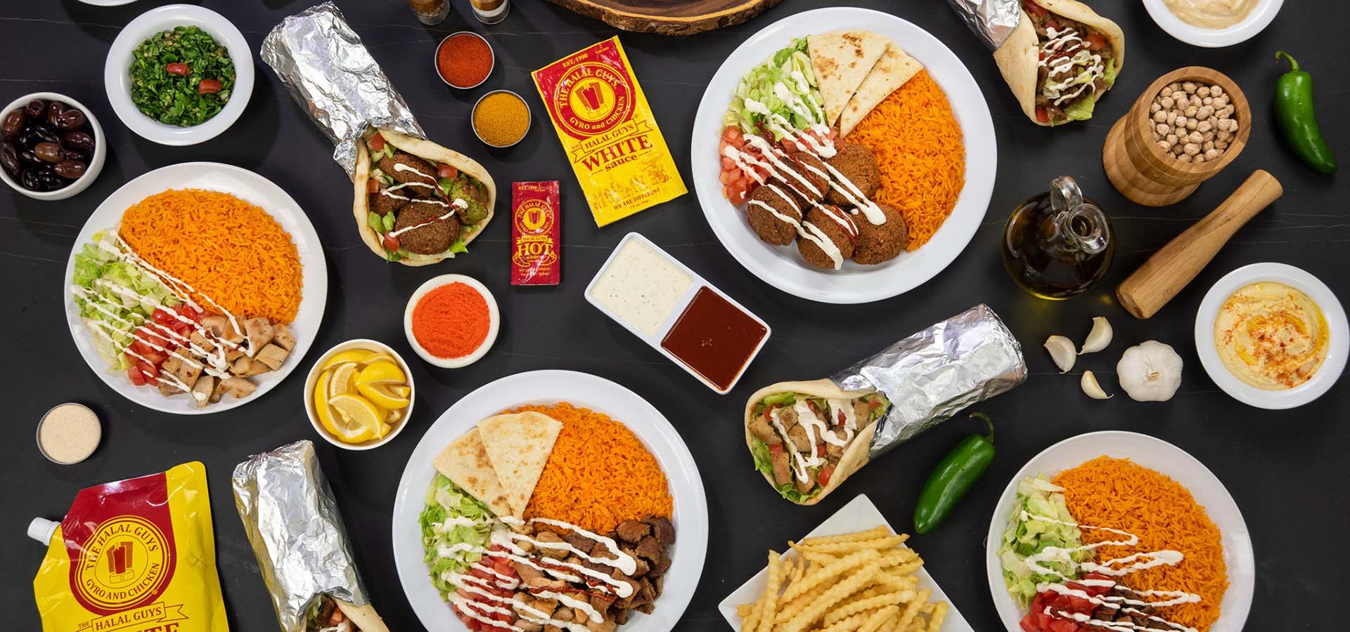 Table set with an American Halal food spread.