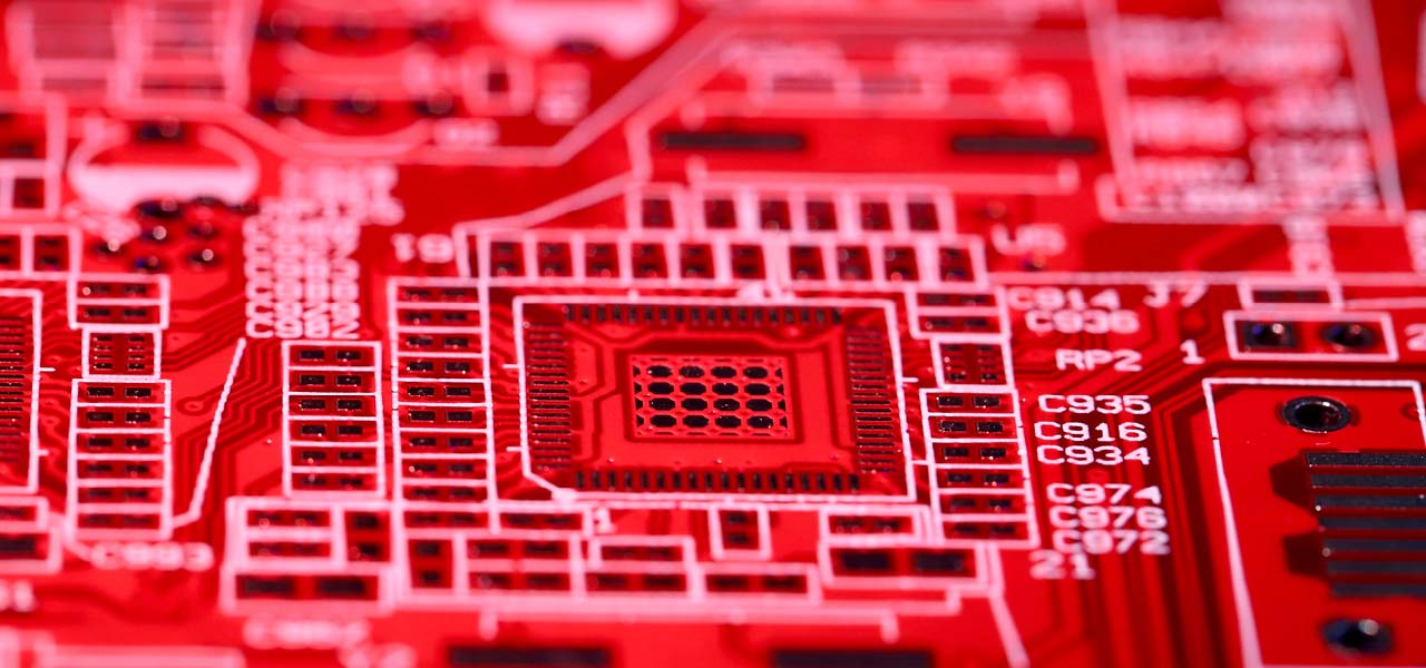 Image of a red circuit board.