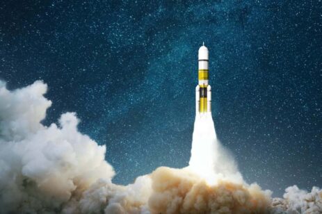 A rocket taking off into space.