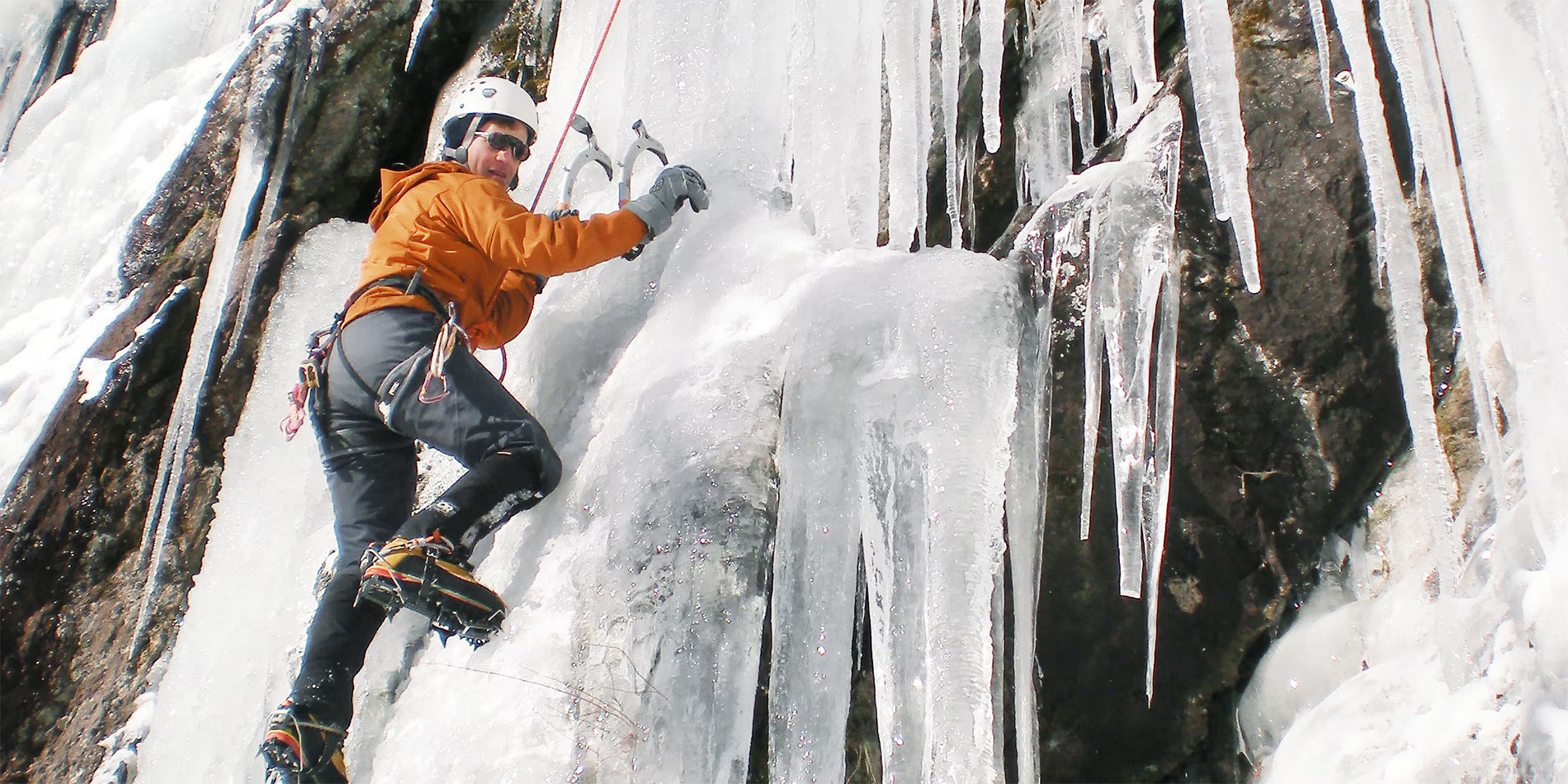 person climbing ice