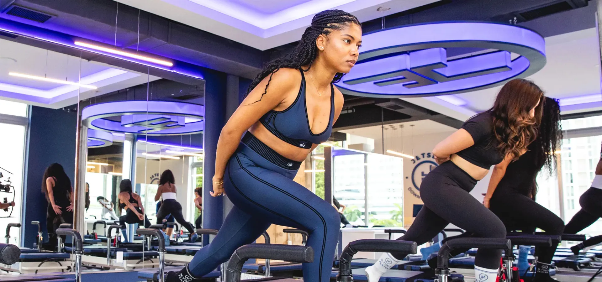 women working out in pilates studio