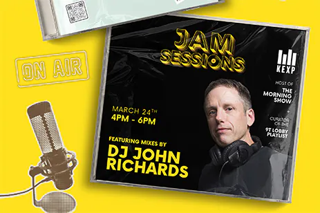 stack of CDs on yellow background