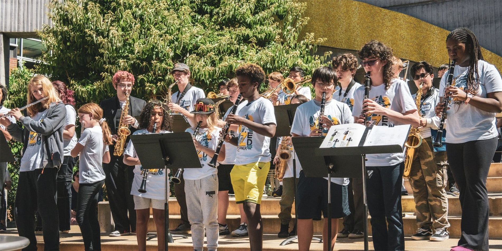 group of kids playing instruments