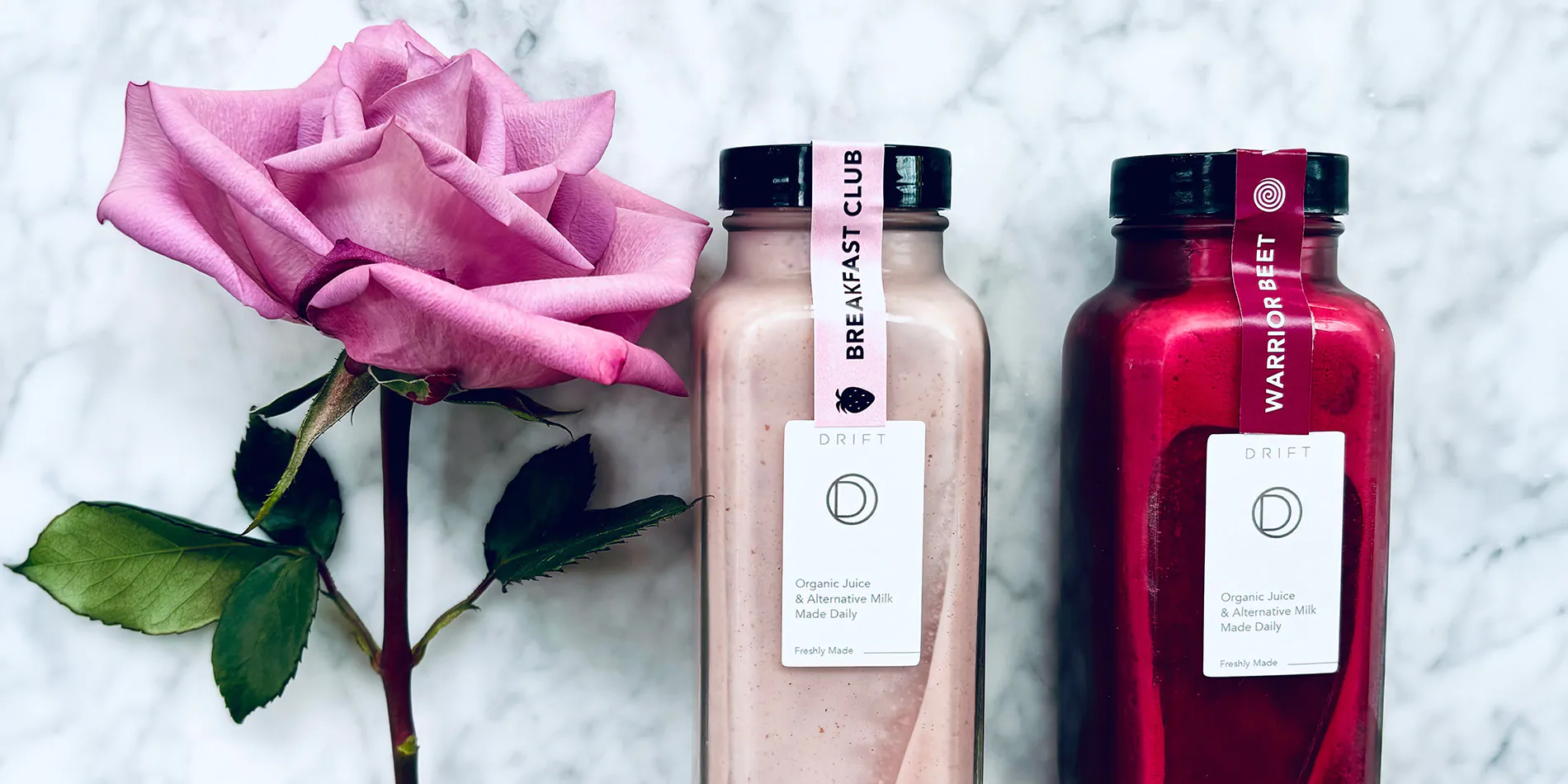 bottles of juice and rose