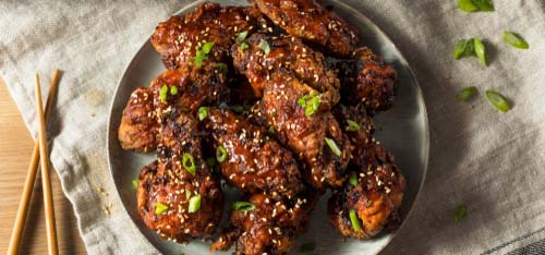 Plate of Korean fried chicken.