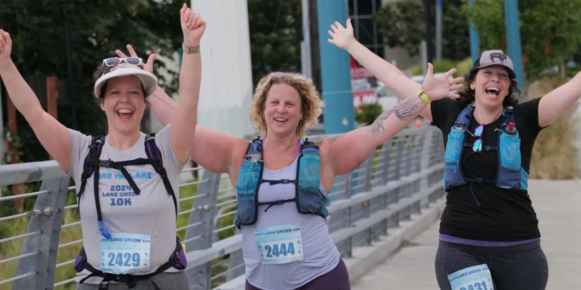 three women celebrating race completion