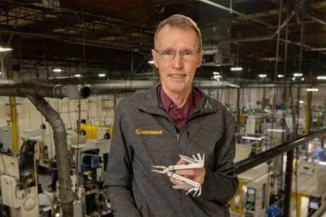 man holding Leatherman
