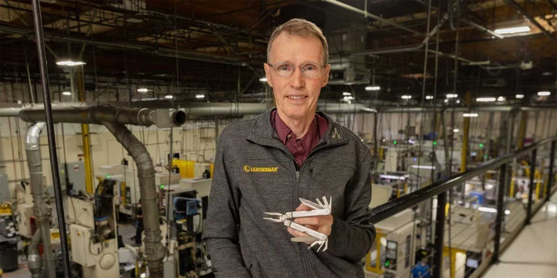 man holding Leatherman