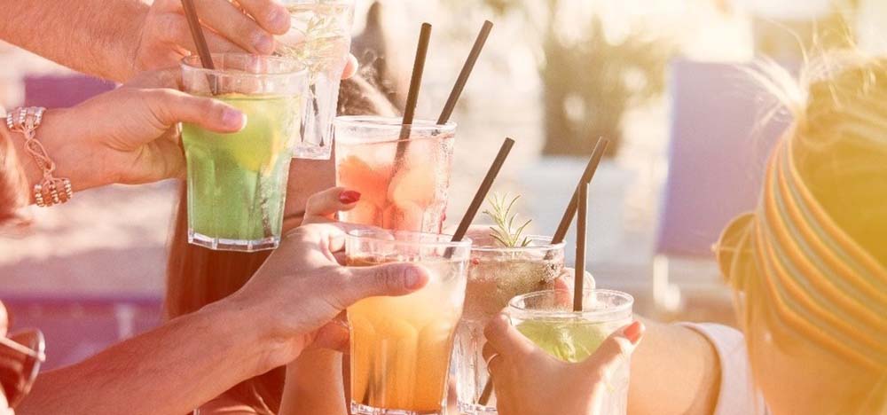 Different margaritas in hands.