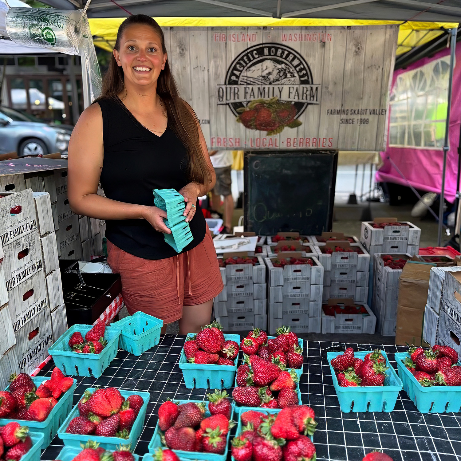 woman at strawberry stand