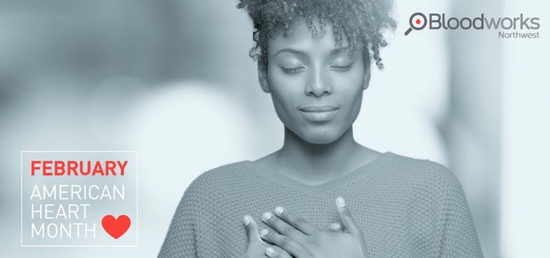 Black and white photo of a woman with her hand over her heart; for February Heart Month.