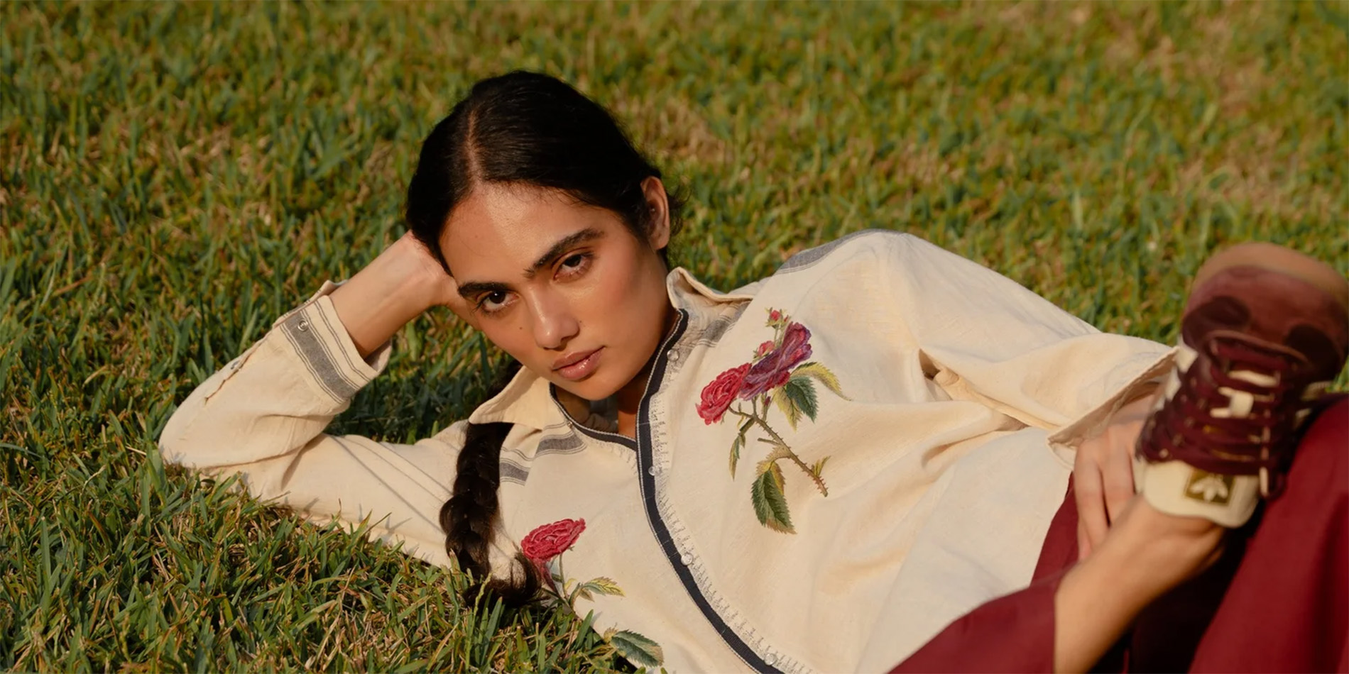 model posing in grass