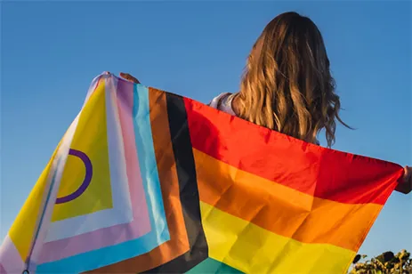 person with pride flag