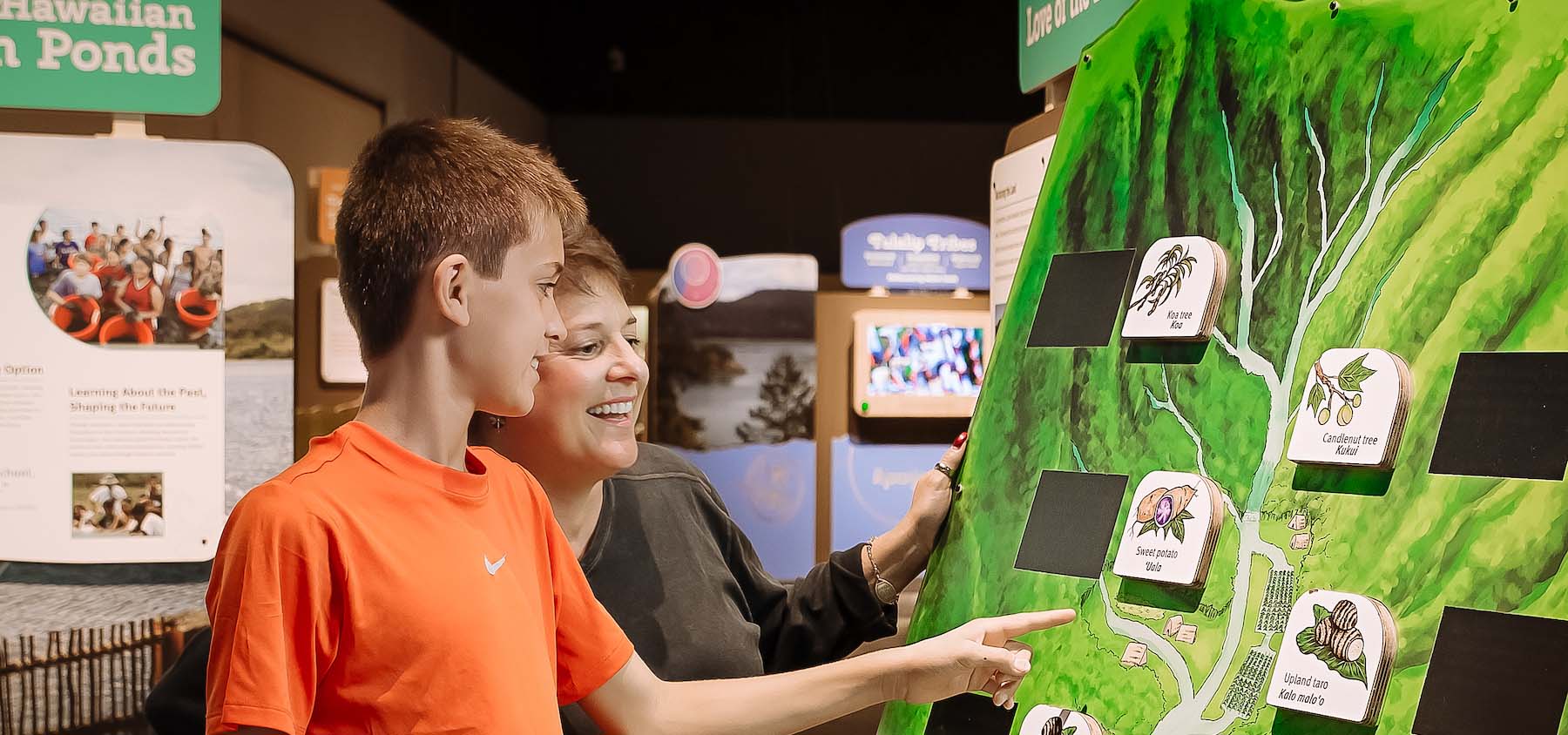 People enjoying a museum exhibit.