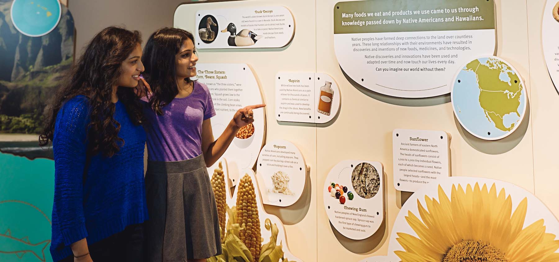 People enjoying a museum exhibit.