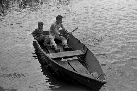 two boys in rowboat