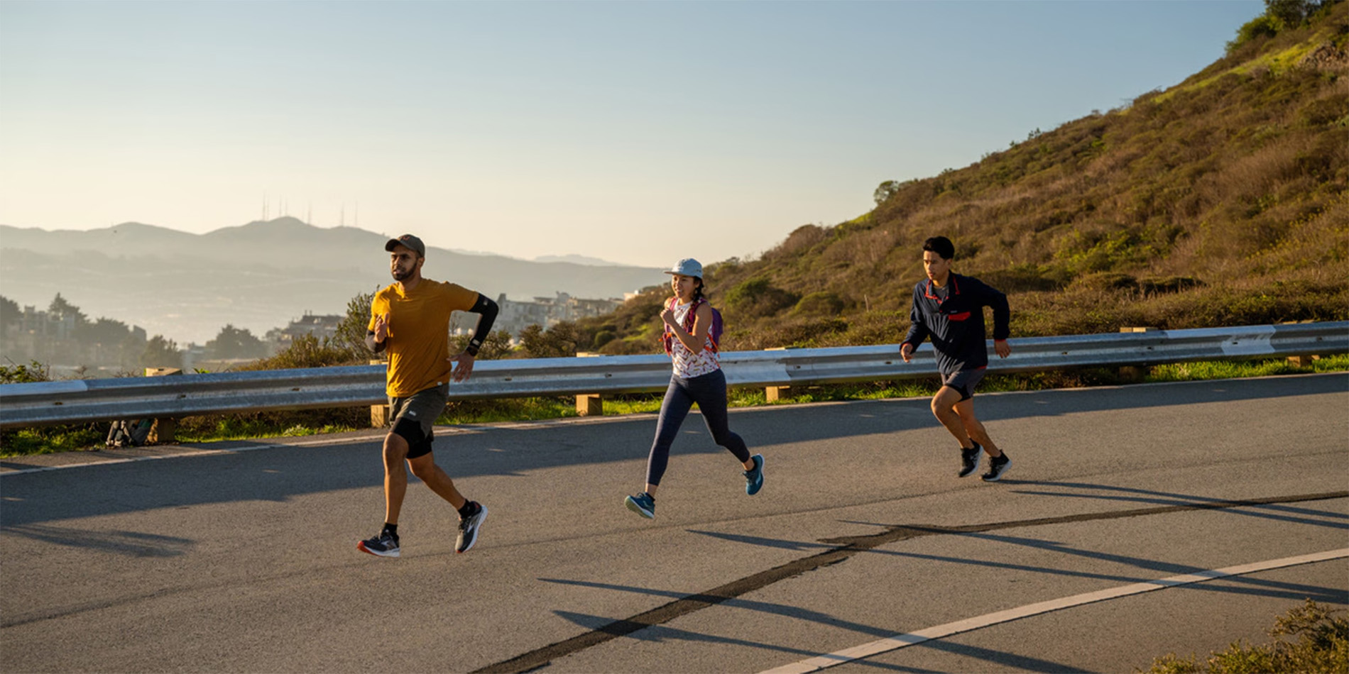 three people running