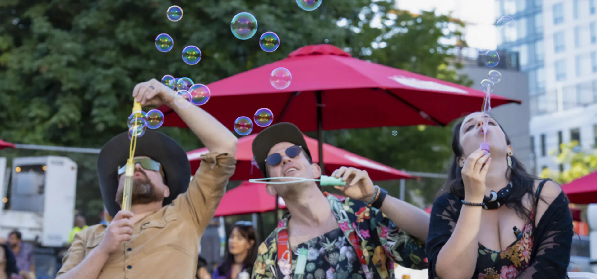people blowing bubbles