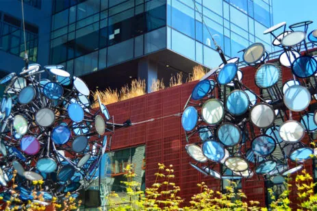 glass artwork in front of building
